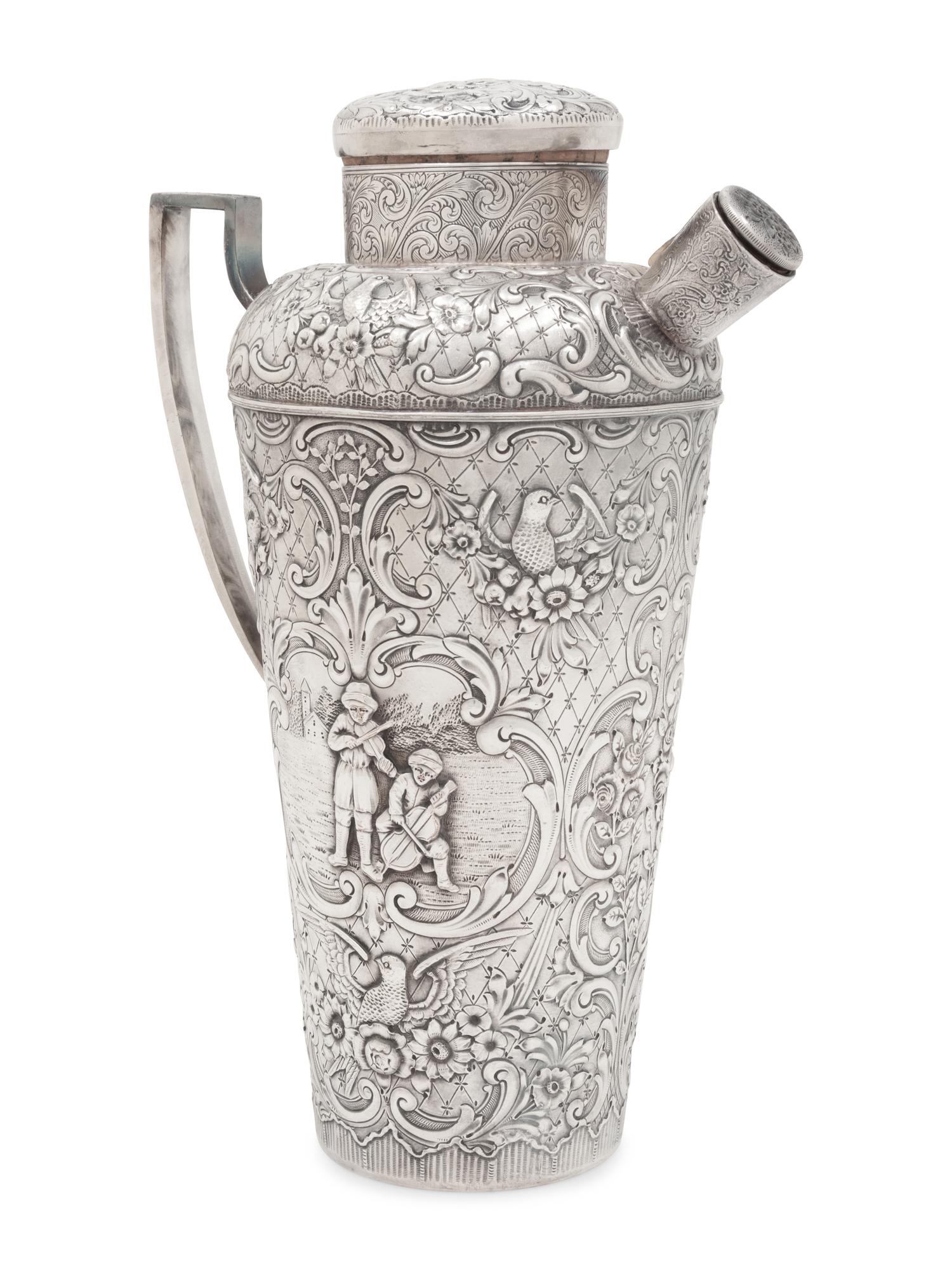 A Repoussé-Decorated Silver-Plate Cocktail Shaker