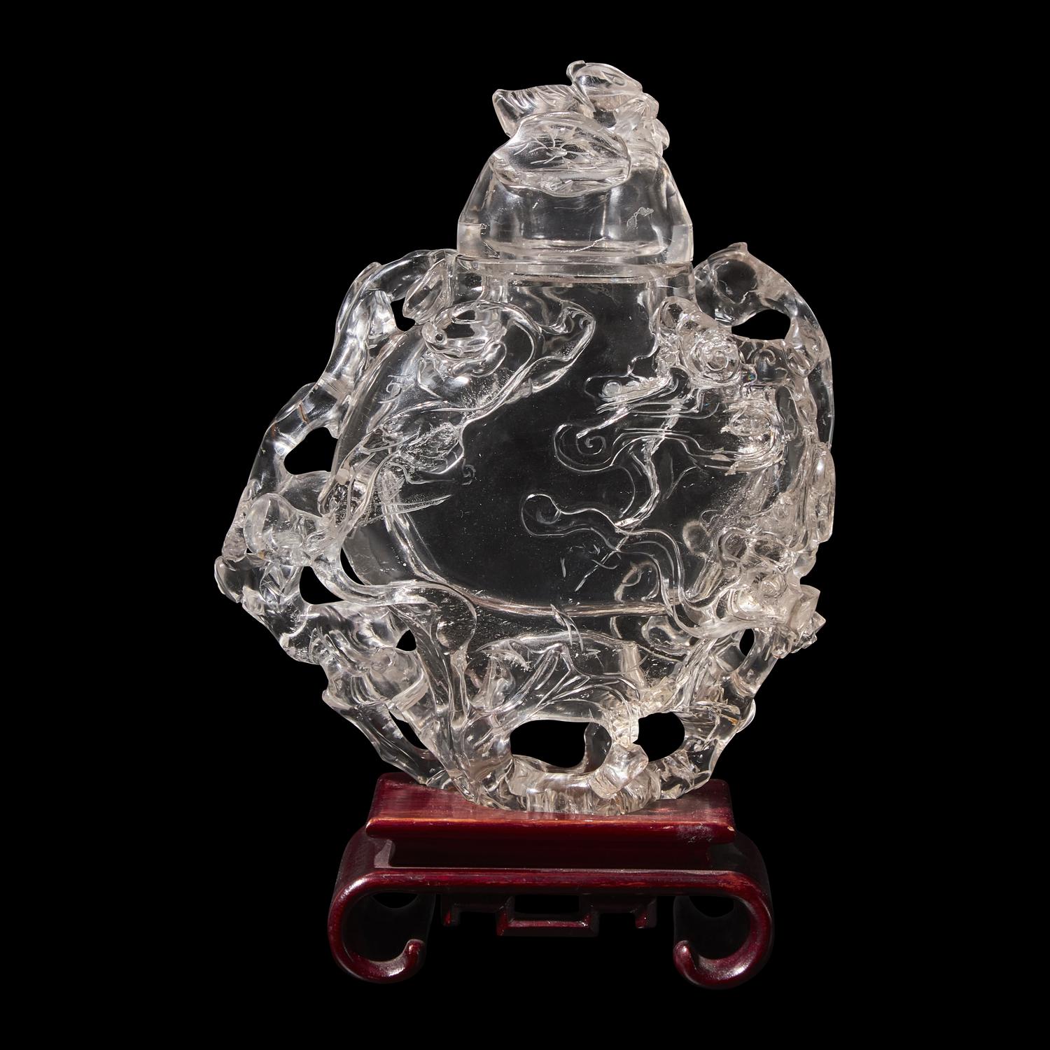 A Chinese Rock Crystal Vase and Cover Carved with Clouds, 20th Century 近代 高浮雕螭龍紋水晶扁壺
