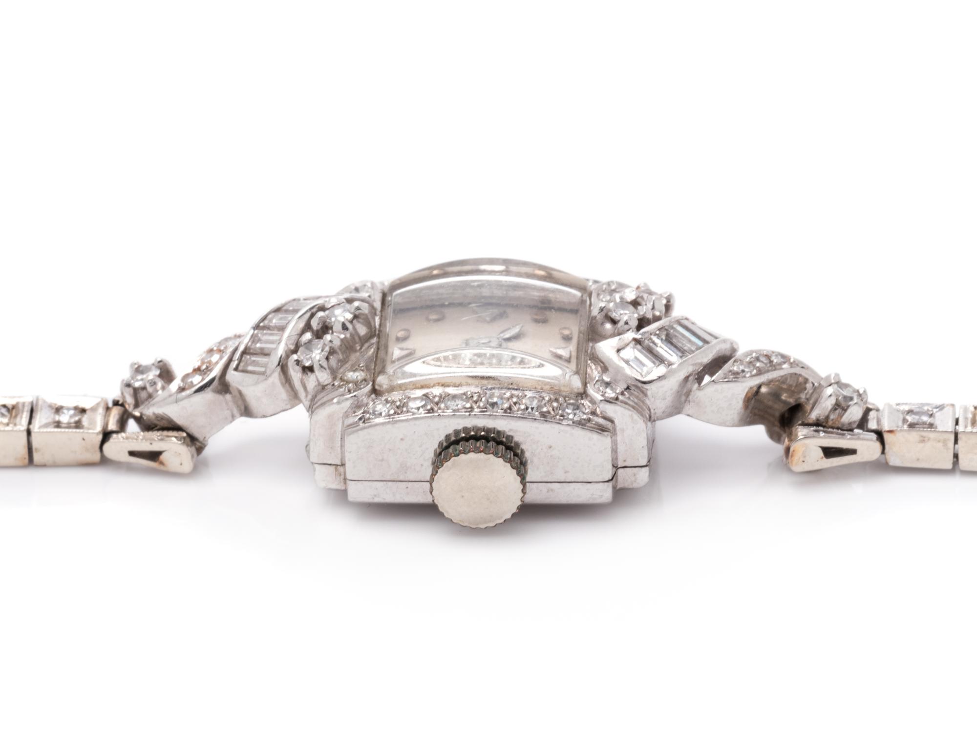 PLATINUM, WHITE GOLD AND DIAMOND WRISTWATCH