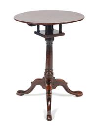 A George III Mahogany Tilt-Top Table Height 25 1/2 x diameter 19 1/2 inches. — CIRCA 1800