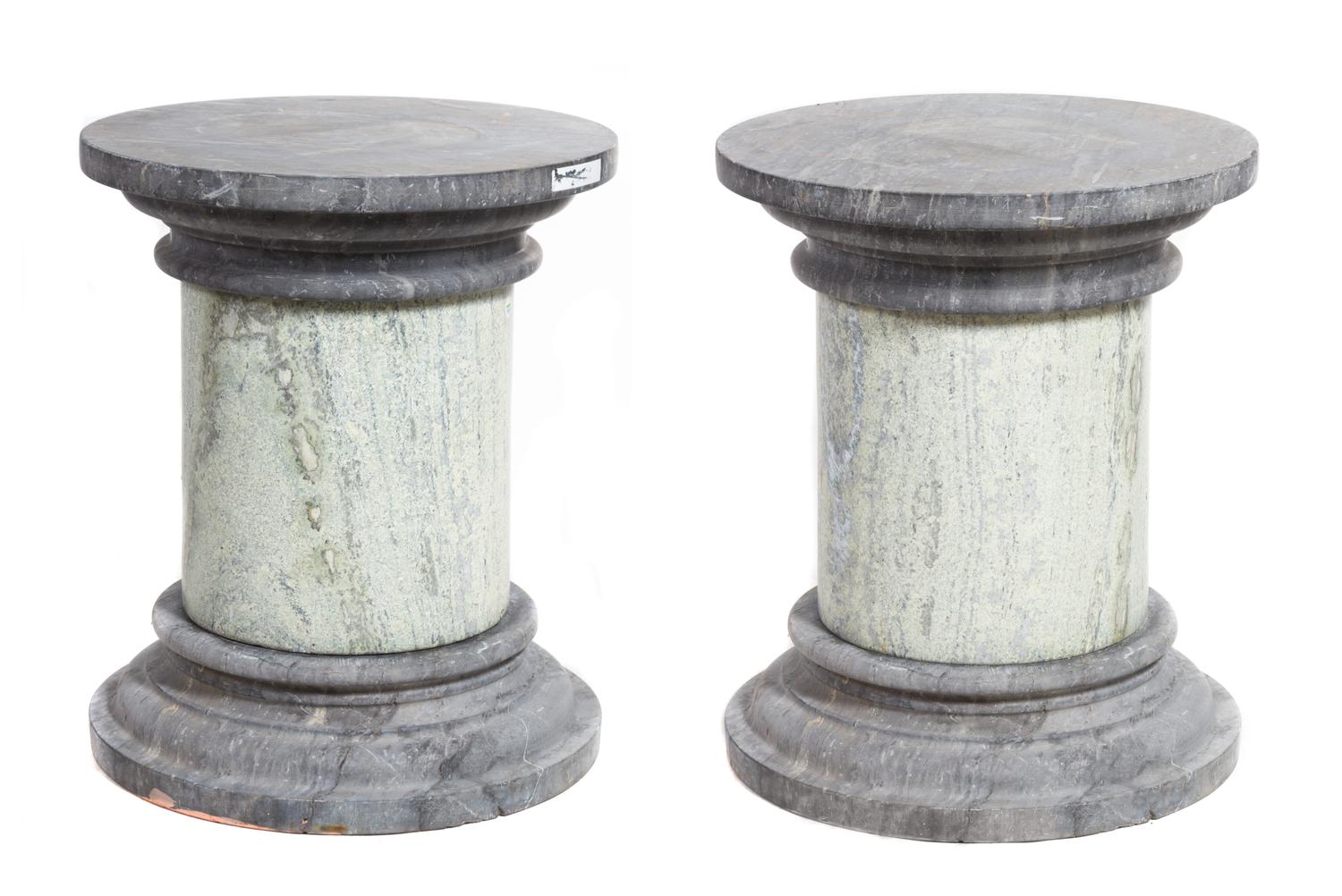 A Pair of Marble Garden Pedestals Height 29 x diameter 24 inches.