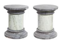 A Pair of Marble Garden Pedestals Height 29 x diameter 24 inches.