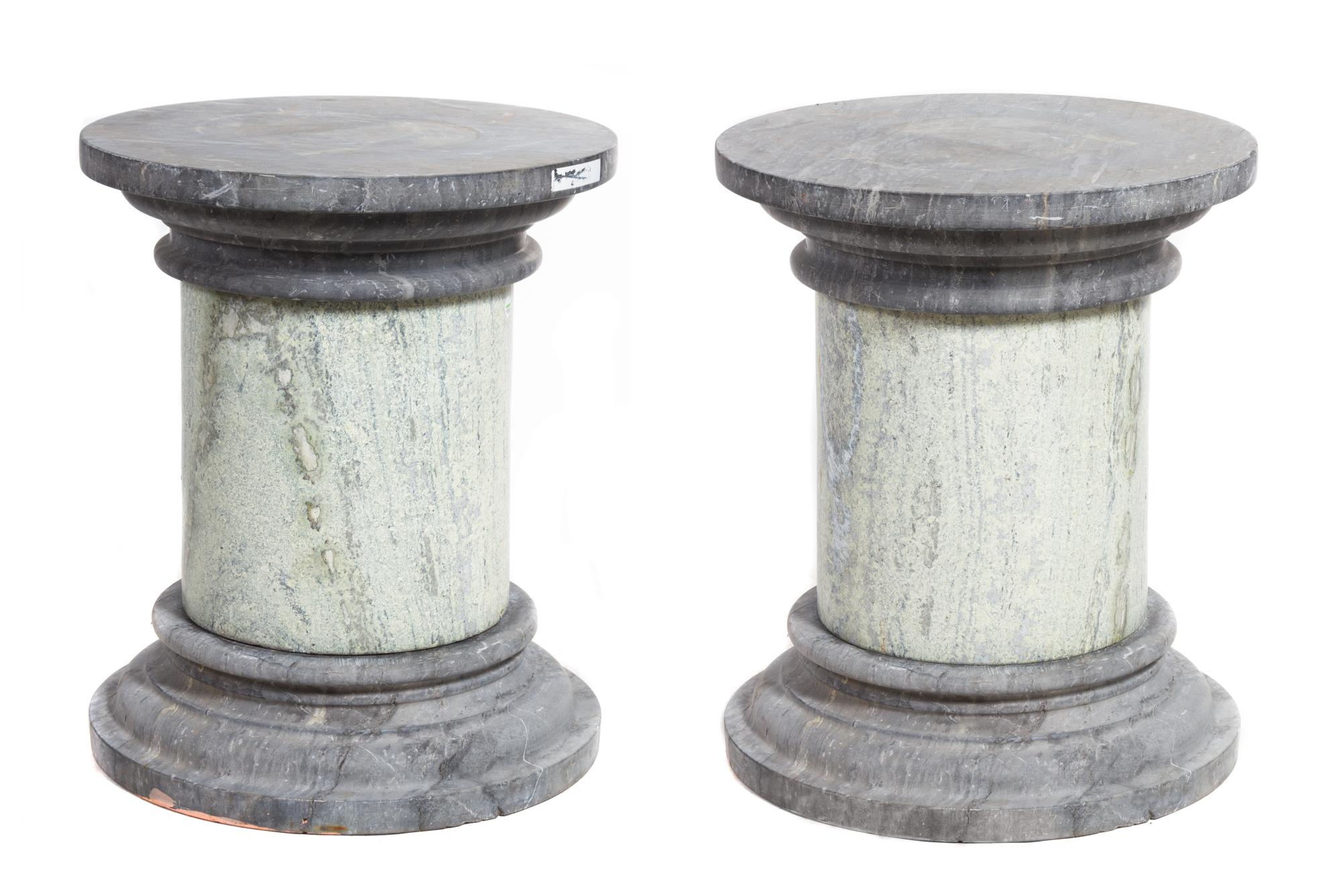 A Pair of Marble Garden Pedestals Height 29 x diameter 24 inches.