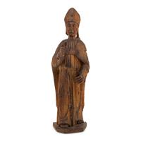 A Carved Walnut Figure of a Bishop