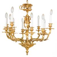 A Louis XV Style Gilt Bronze Twelve-Light Chandelier Height 24 x diameter 30 inches. — 20TH CENTURY
