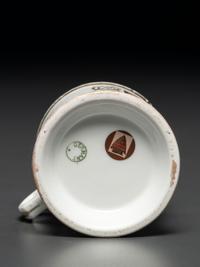 A Photographic Transfer Porcelain Shaving Mug Depicting the Arion Theatre, New York