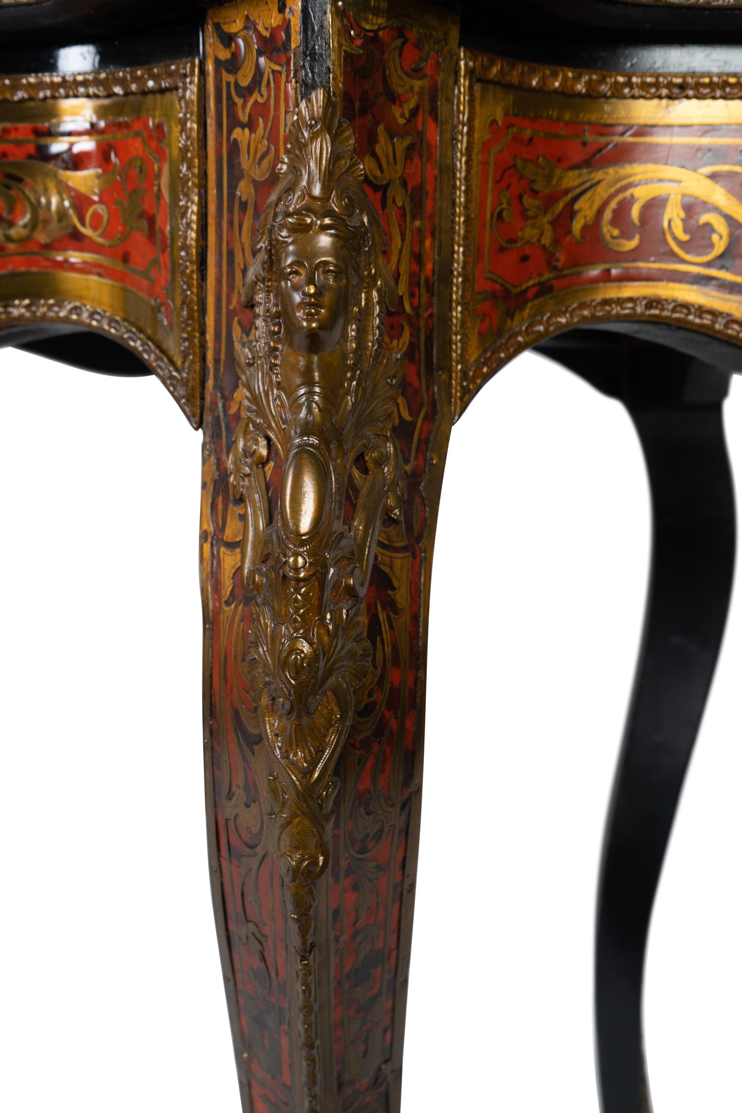 A Napoleon III Style Brass and Tortoise Shell Inlaid Center Table