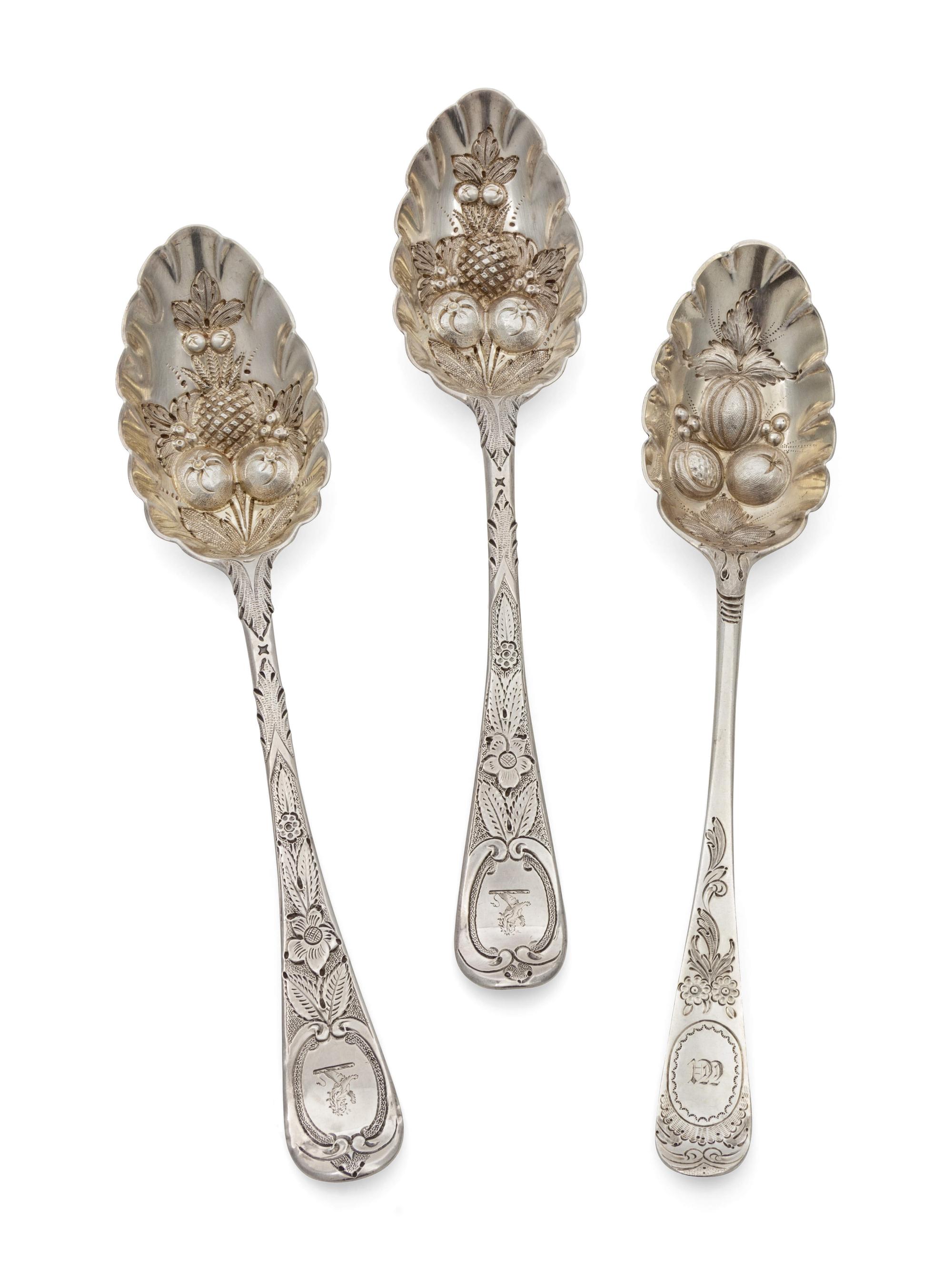 A Group of Three George III Silver Berry Spoons
