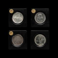 A Group of Four United States Commemorative 50c Coins