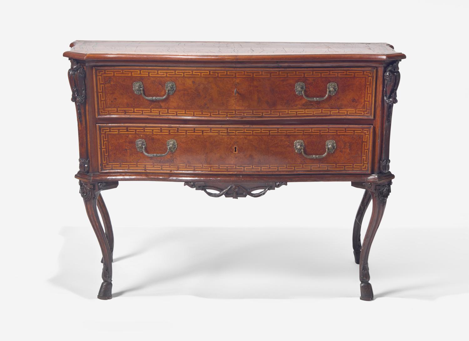 A Rococo Burr Walnut and Fruitwood Commode