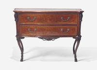 A Rococo Burr Walnut and Fruitwood Commode
