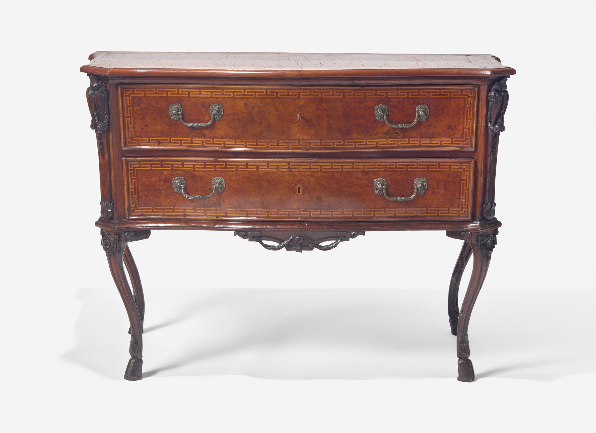A Rococo Burr Walnut and Fruitwood Commode