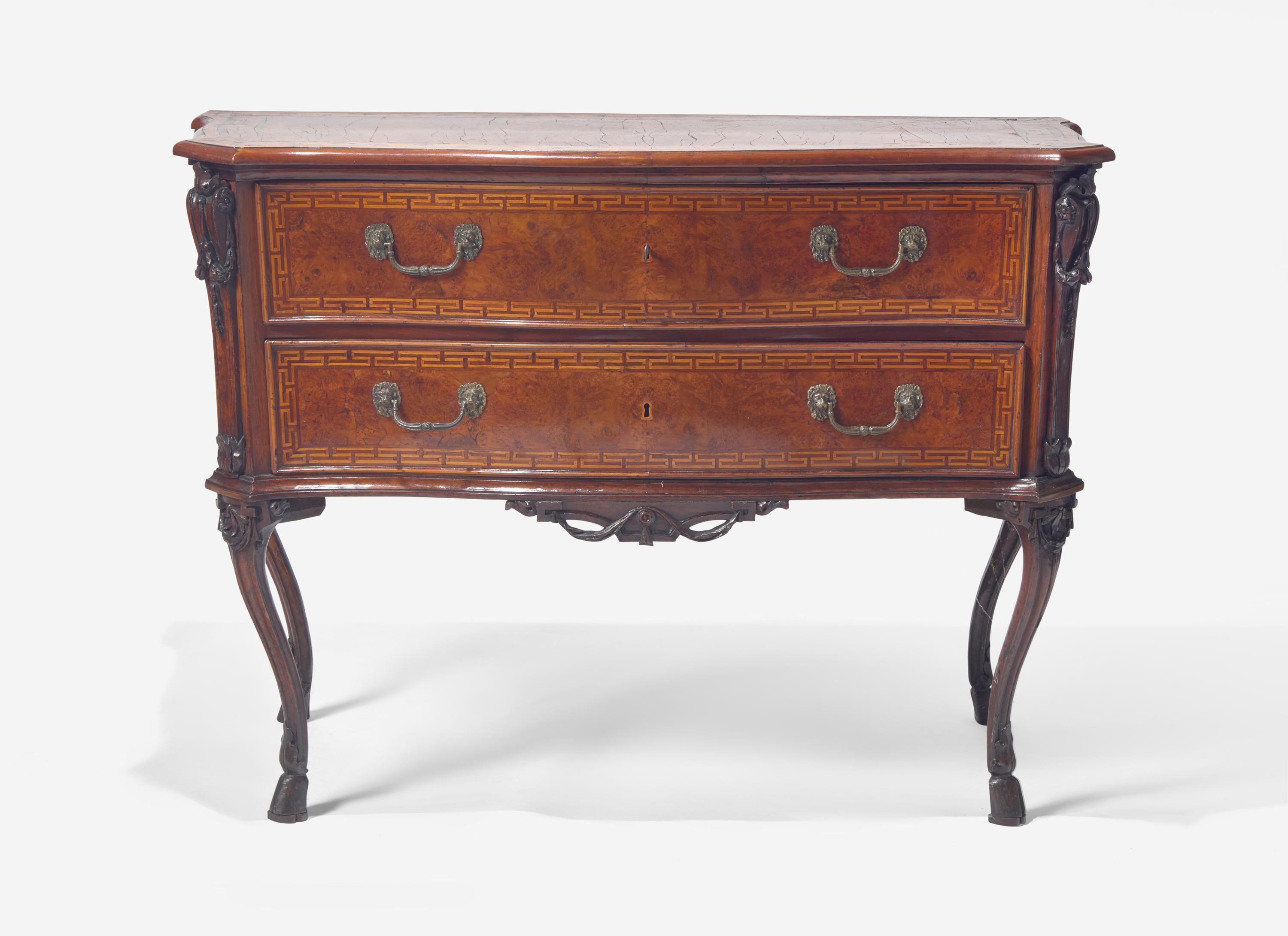 A Rococo Burr Walnut and Fruitwood Commode