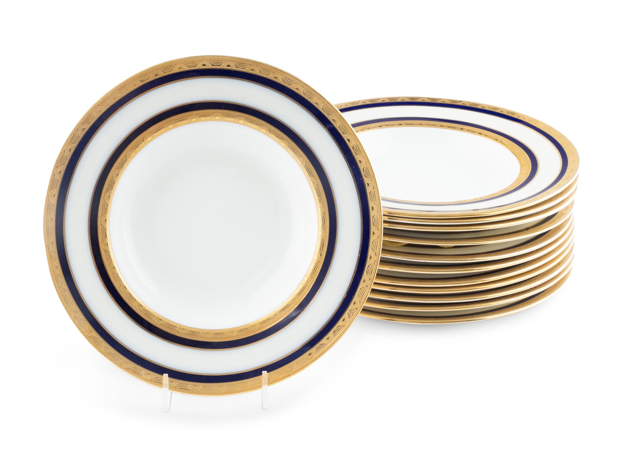 A Set of Twelve Mintons Porcelain Dinner Plates and Salad Plates