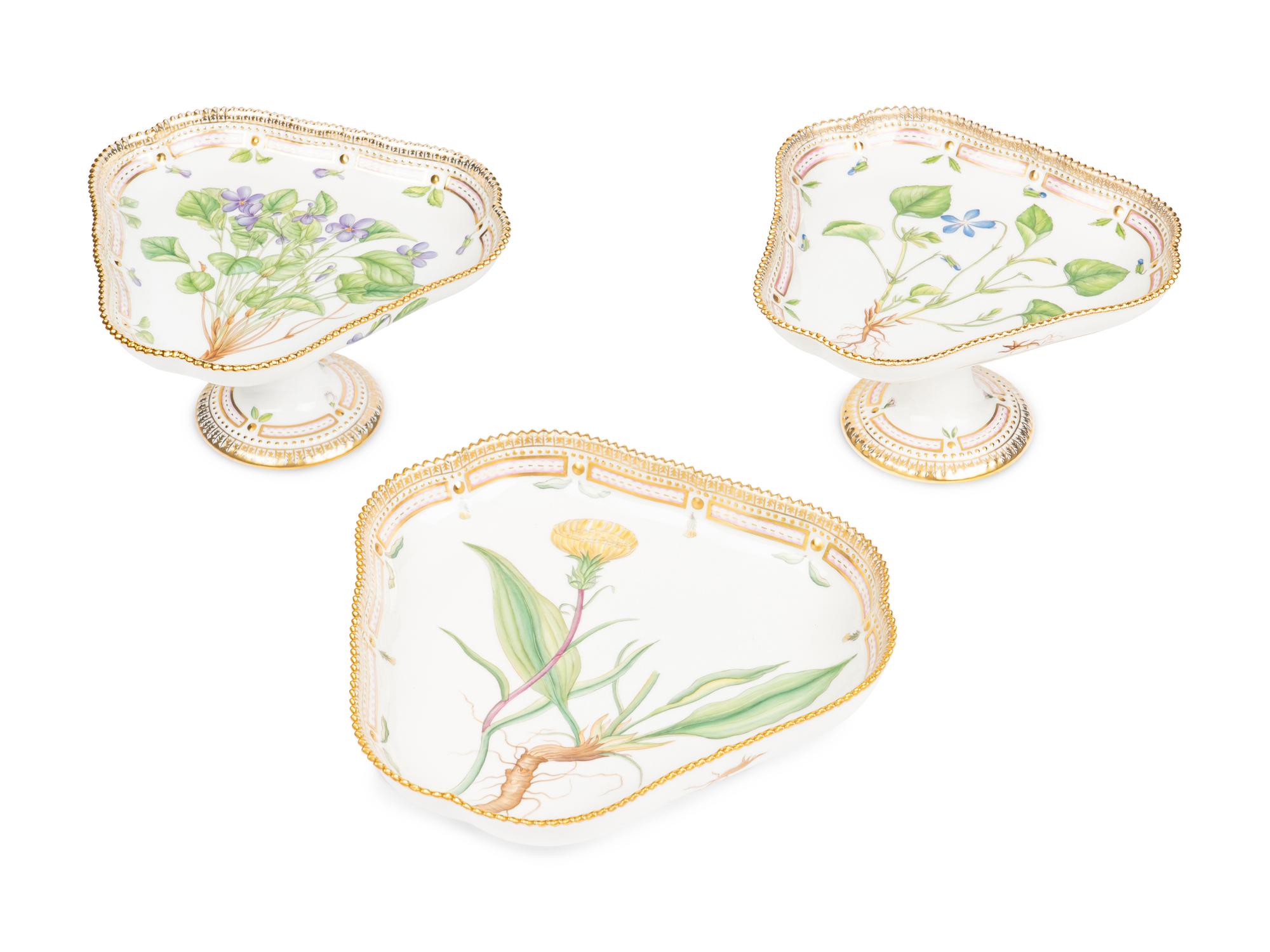 A Pair of Royal Copenhagen Flora Danica Porcelain Triangular Compotes and a Triangular Salad Bowl