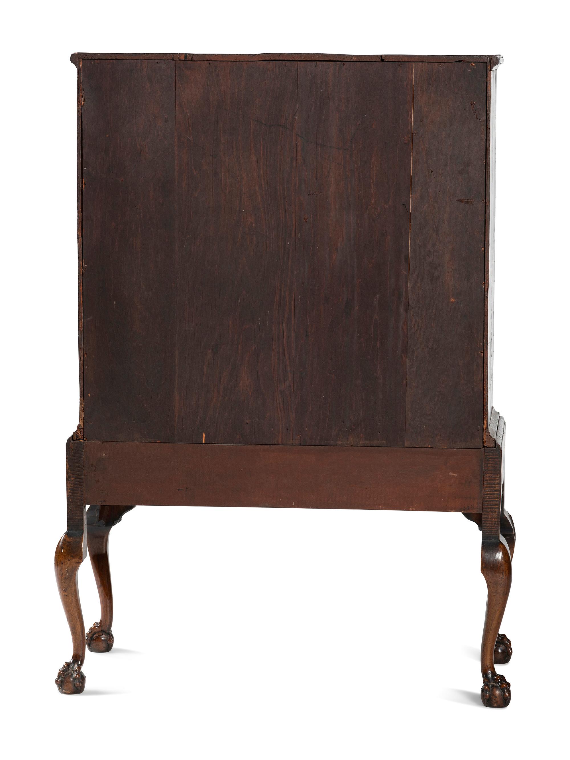 A George II Shell-Carved and Parcel Gilt Walnut-Veneered Chest-on-Stand