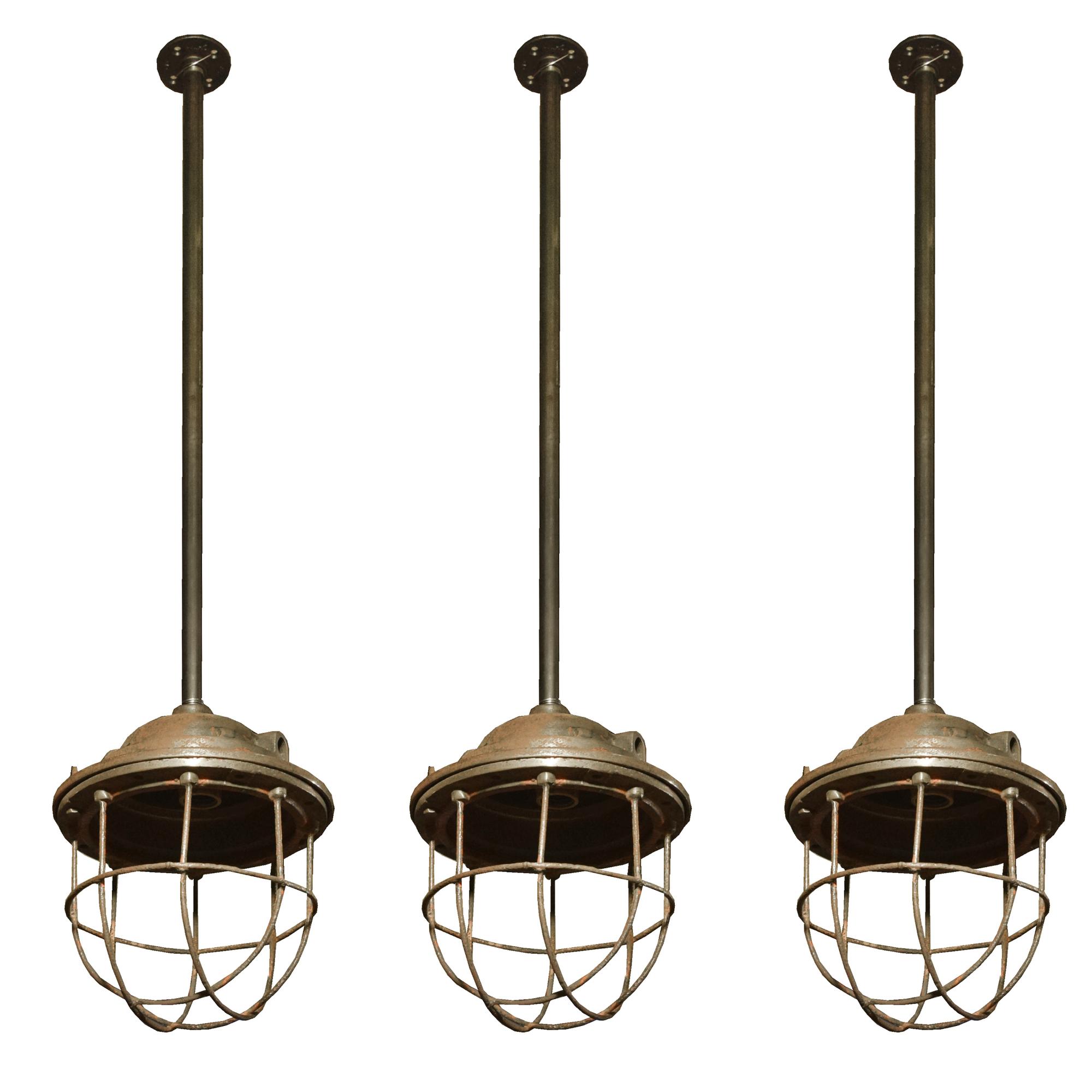 A Set of Three Cast Iron Light Fixtures 10" W x 10" D x 42" H — England, 20th Century