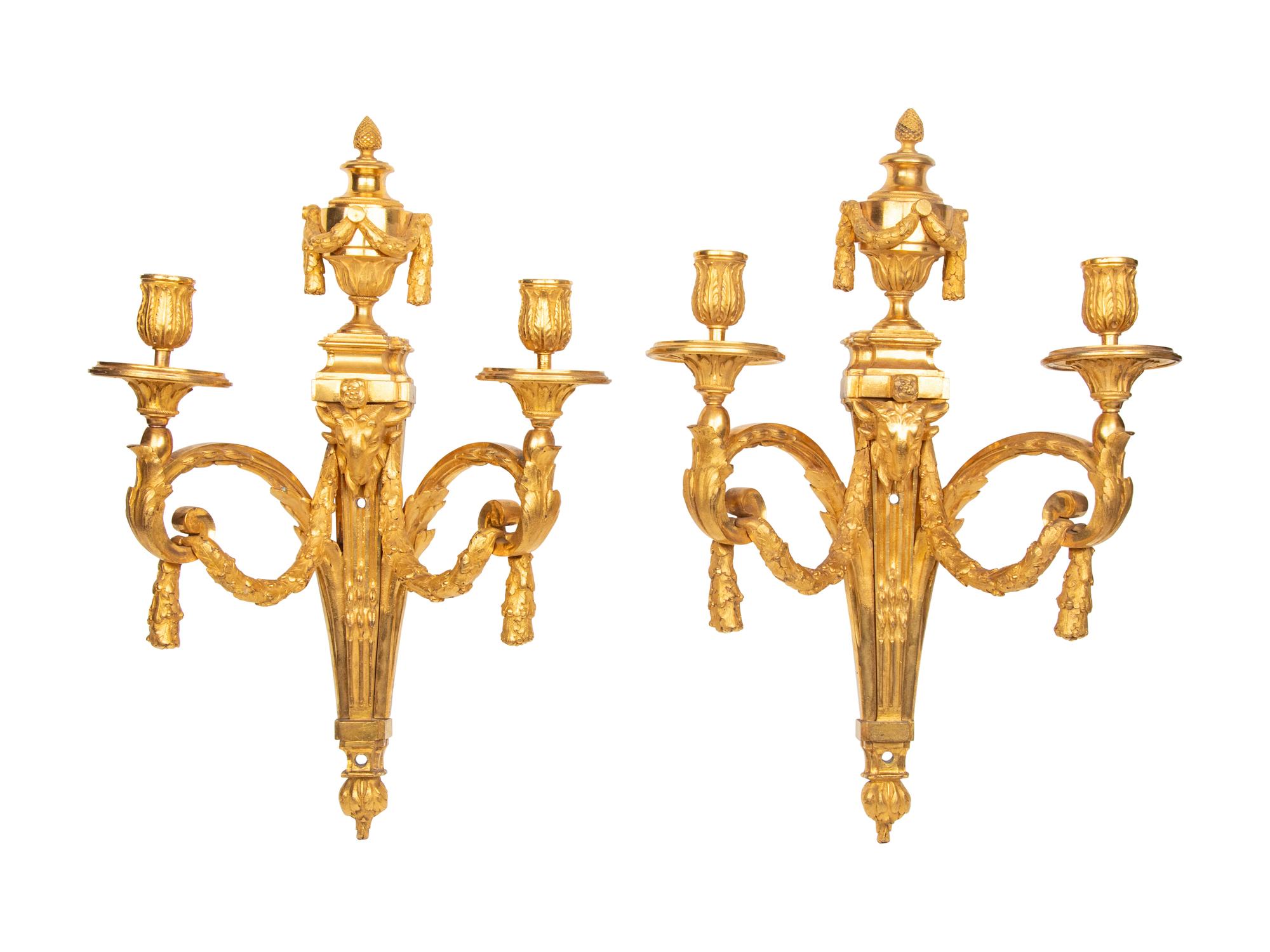 A Pair of Louis XV/XVI Transitional Gilt Bronze Two-Light Wall Sconces