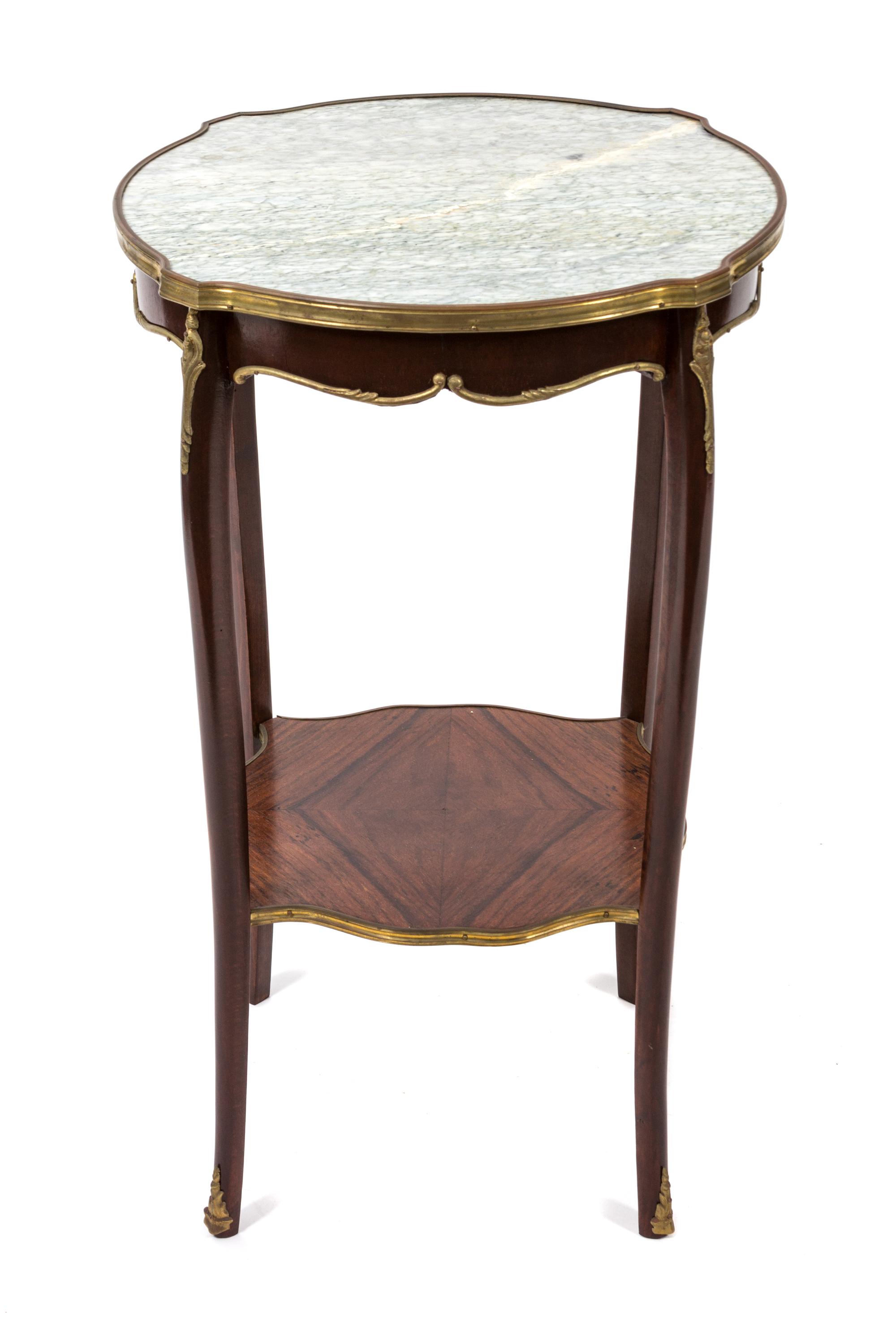 Two Similar Louis XV Style Gilt and Marble Top Gueridons Height 27 1/2 x diameter 17 inches. — LATE 19TH CENTURY