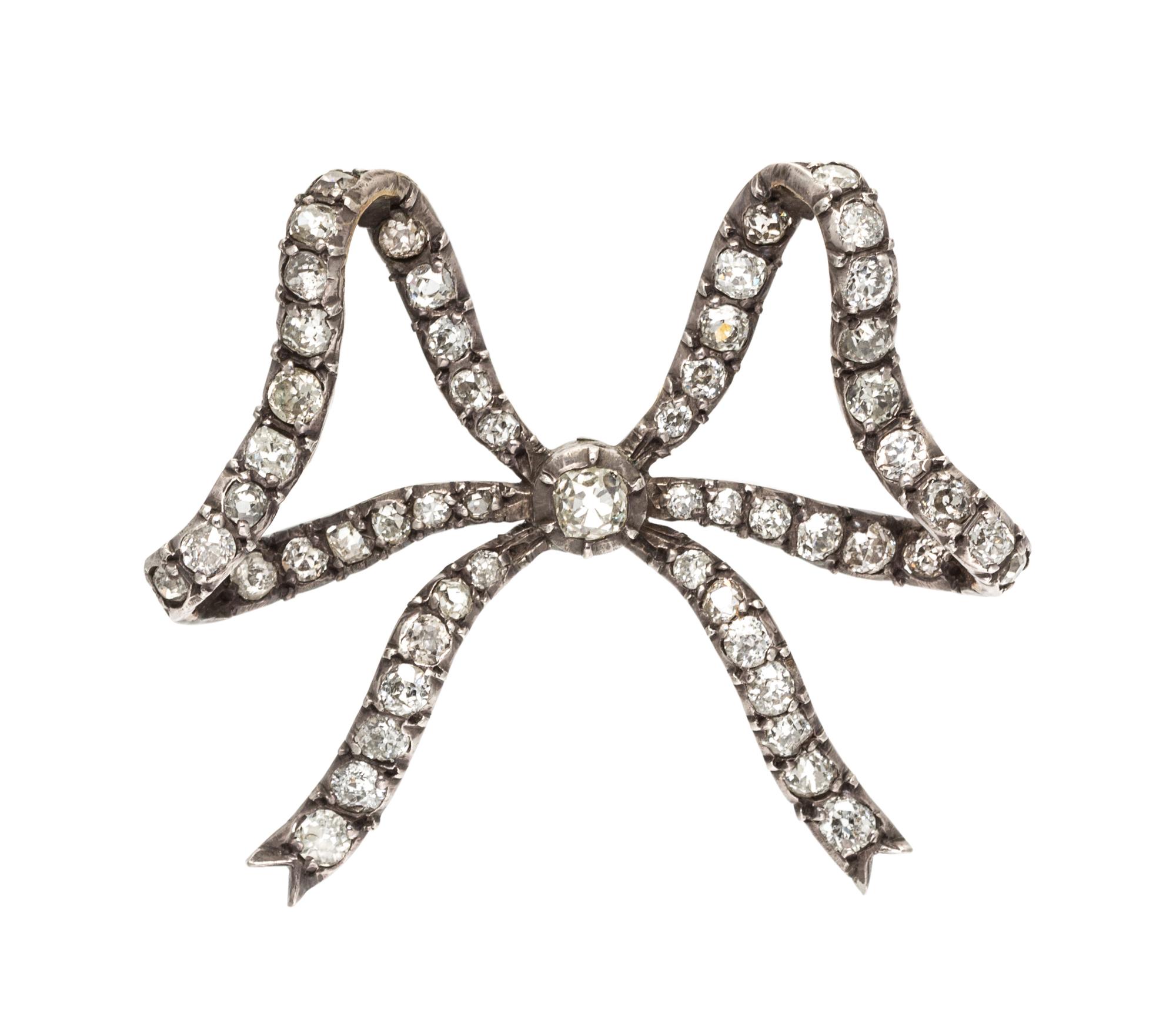 A Victorian Silver Topped Gold and Diamond Bow Brooch, 9.10 dwts.