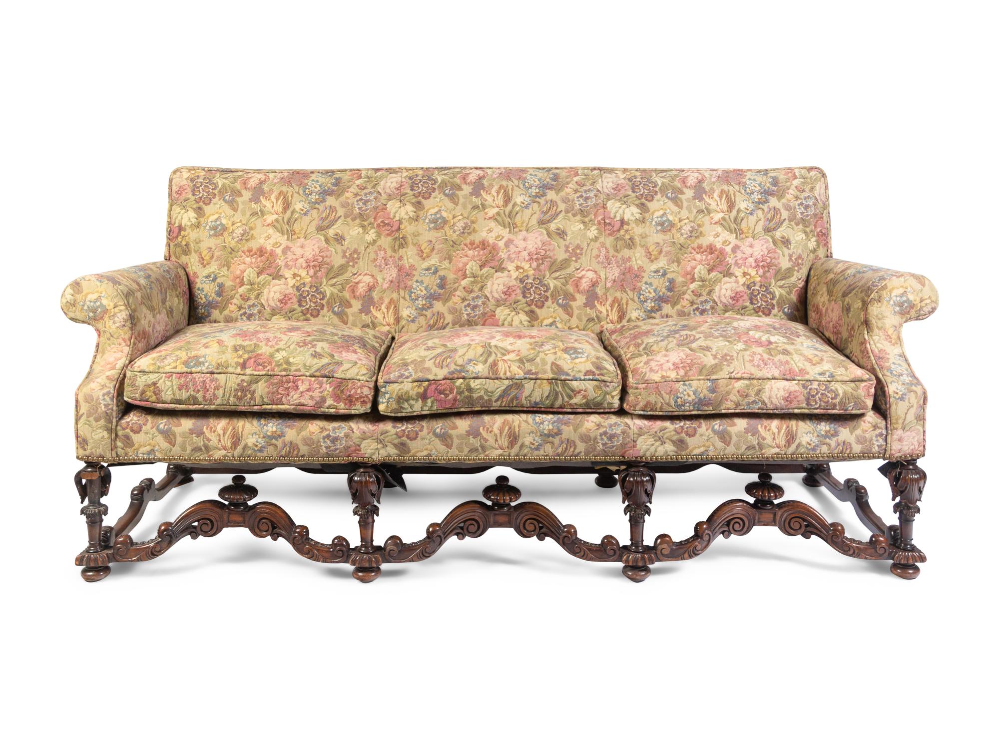 A William and Mary Style Carved Walnut Sofa