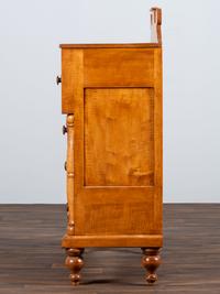 A Late Federal Tiger Maple Chest of Drawers