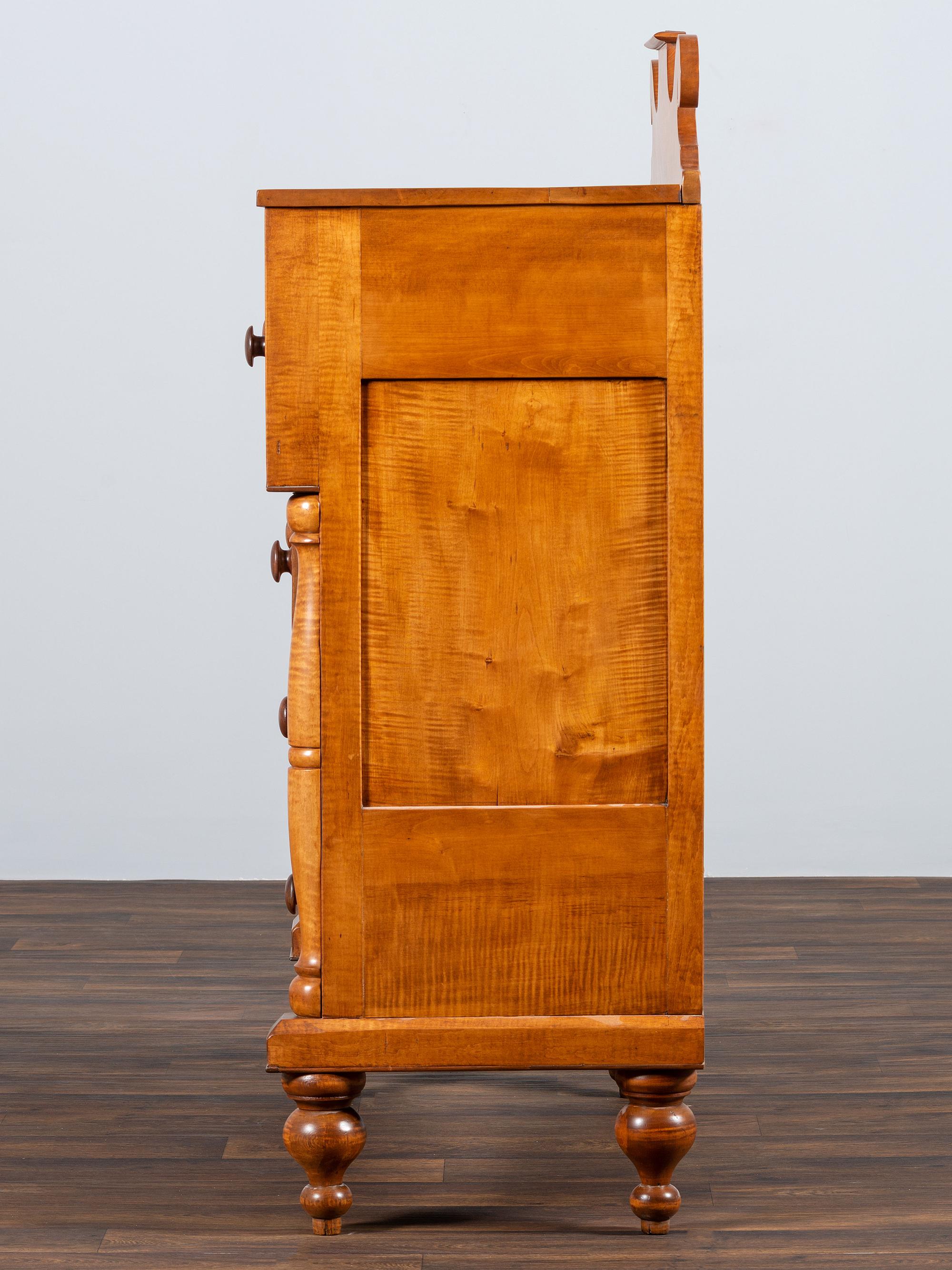 A Late Federal Tiger Maple Chest of Drawers