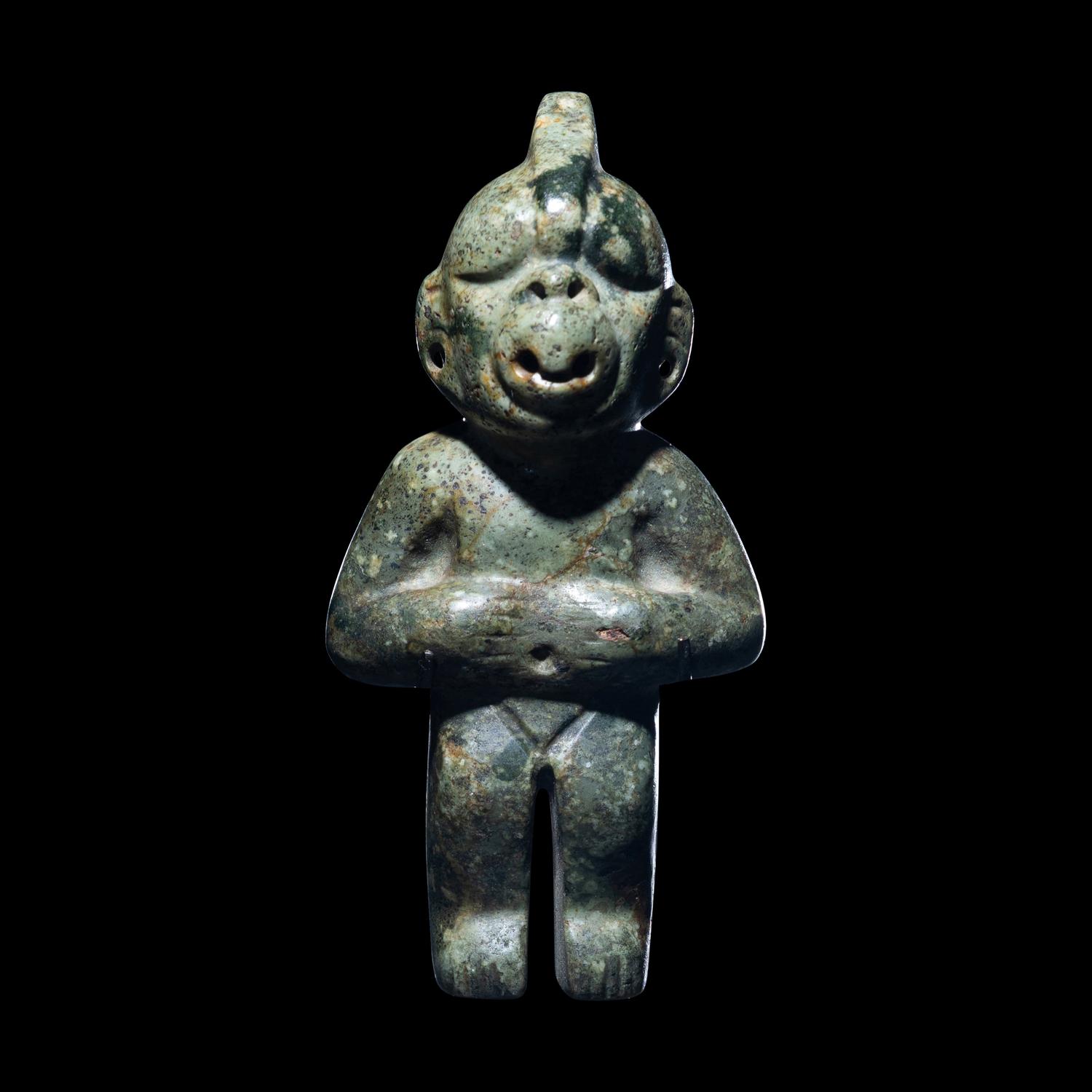 An Olmec Jade Transformation Figure