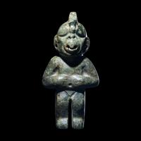 An Olmec Jade Transformation Figure