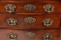 A Portuguese Carved Walnut Commode
