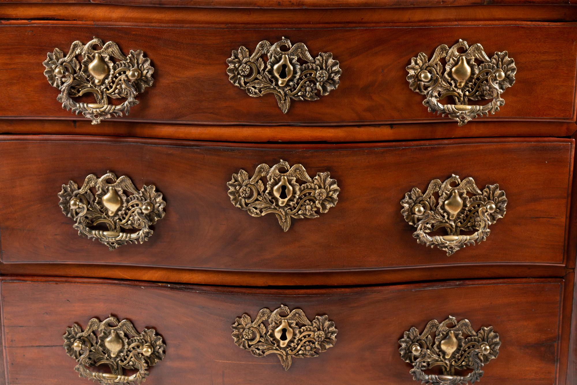 A Portuguese Carved Walnut Commode