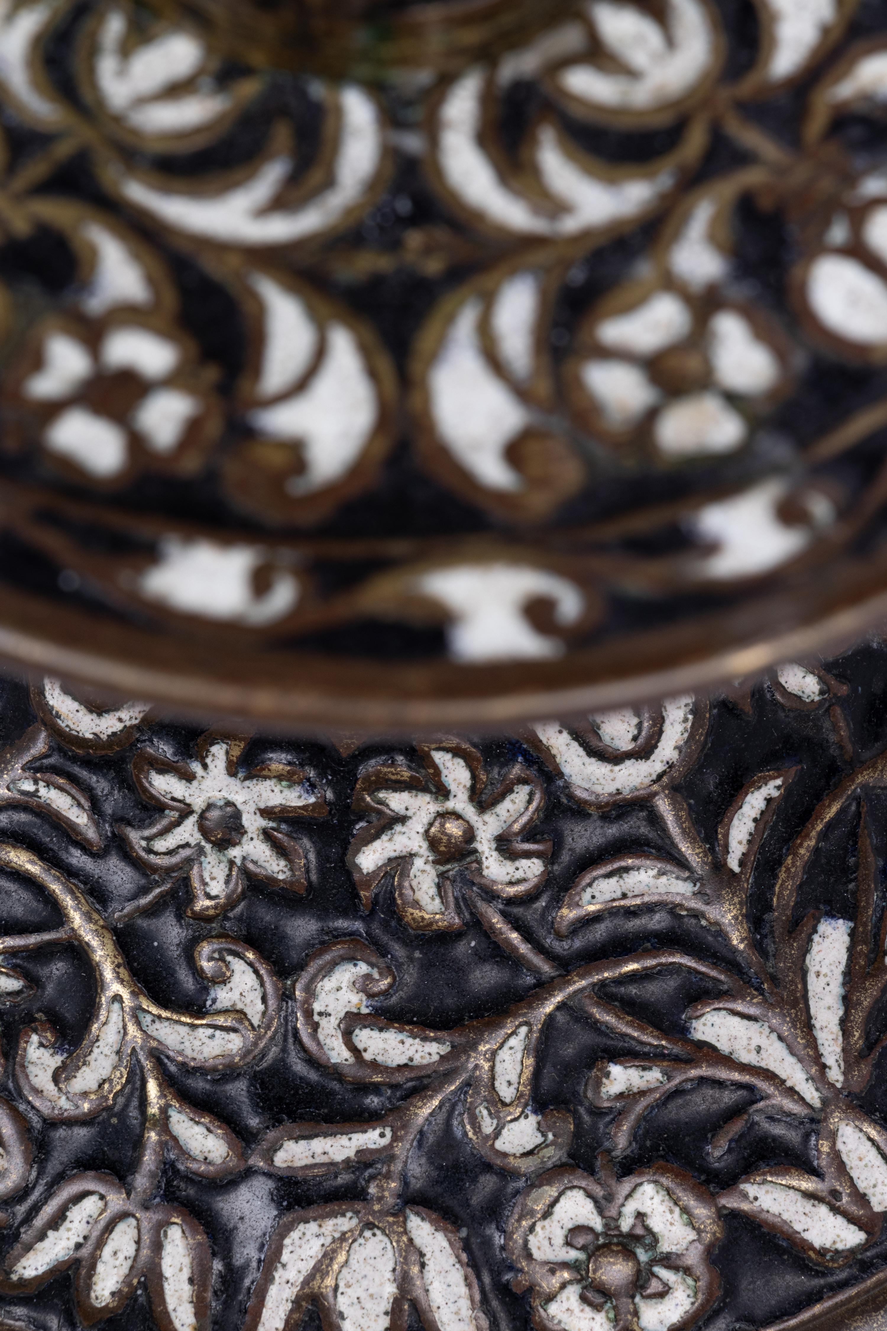 A Pair of Cast Brass 'Surrey Enamel' Candlesticks