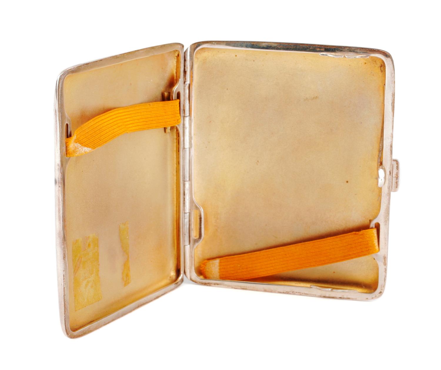 A German Enameled Silver Cigarette Case, Lutz & Wiess, Pforzheim, Late 19th/Early 20th Century, the lid enameled to show a nude model i