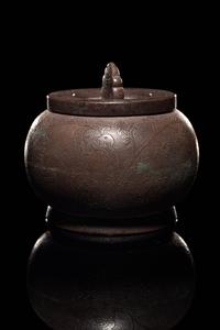 An Incised Silver Covered Jar