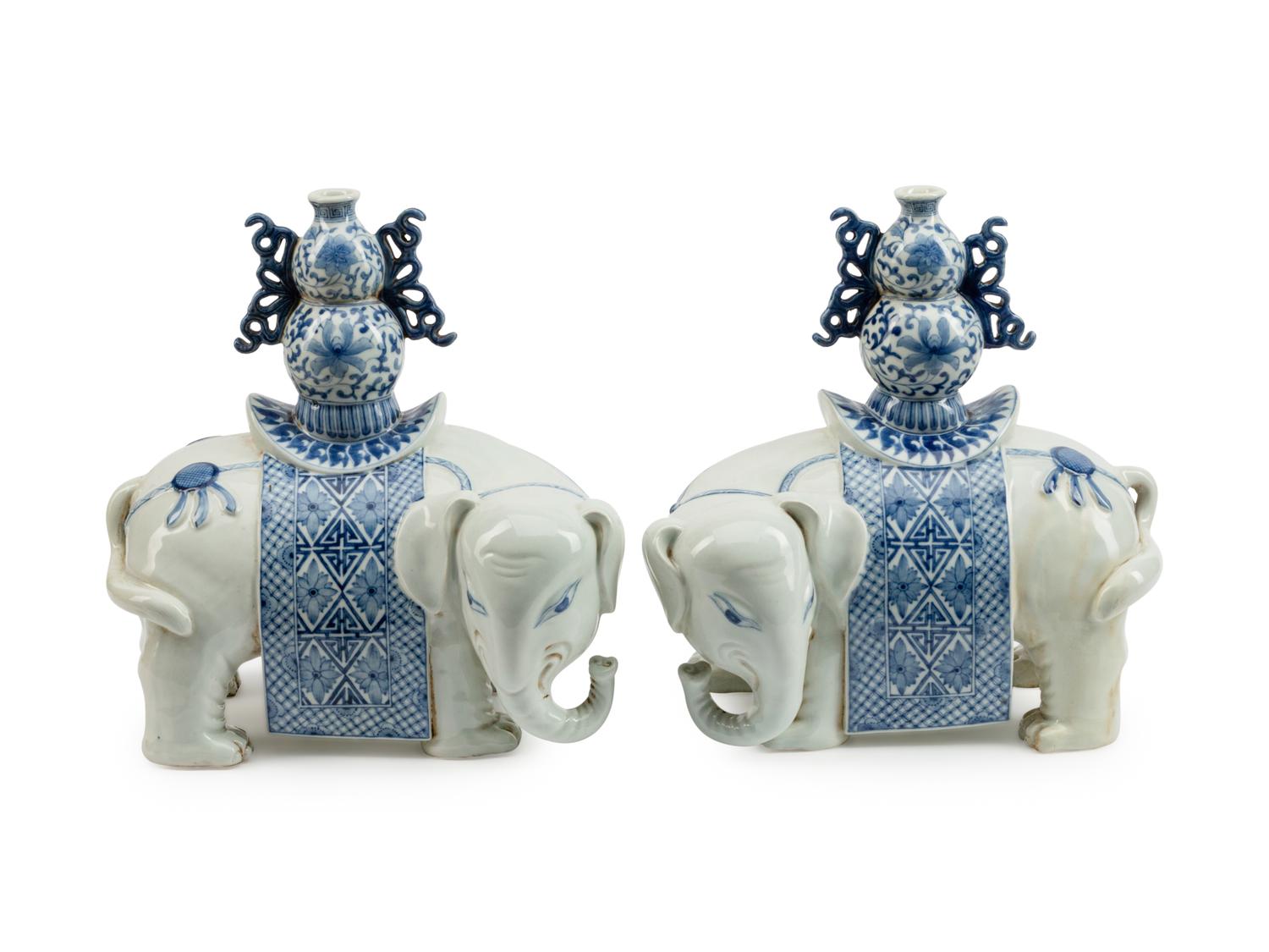A Pair of Chinese Export Style Porcelain Elephants