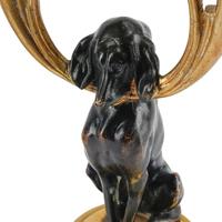 A Pair of Gilt and Patinated Bronze Dog Motif Two-Light Candelabra