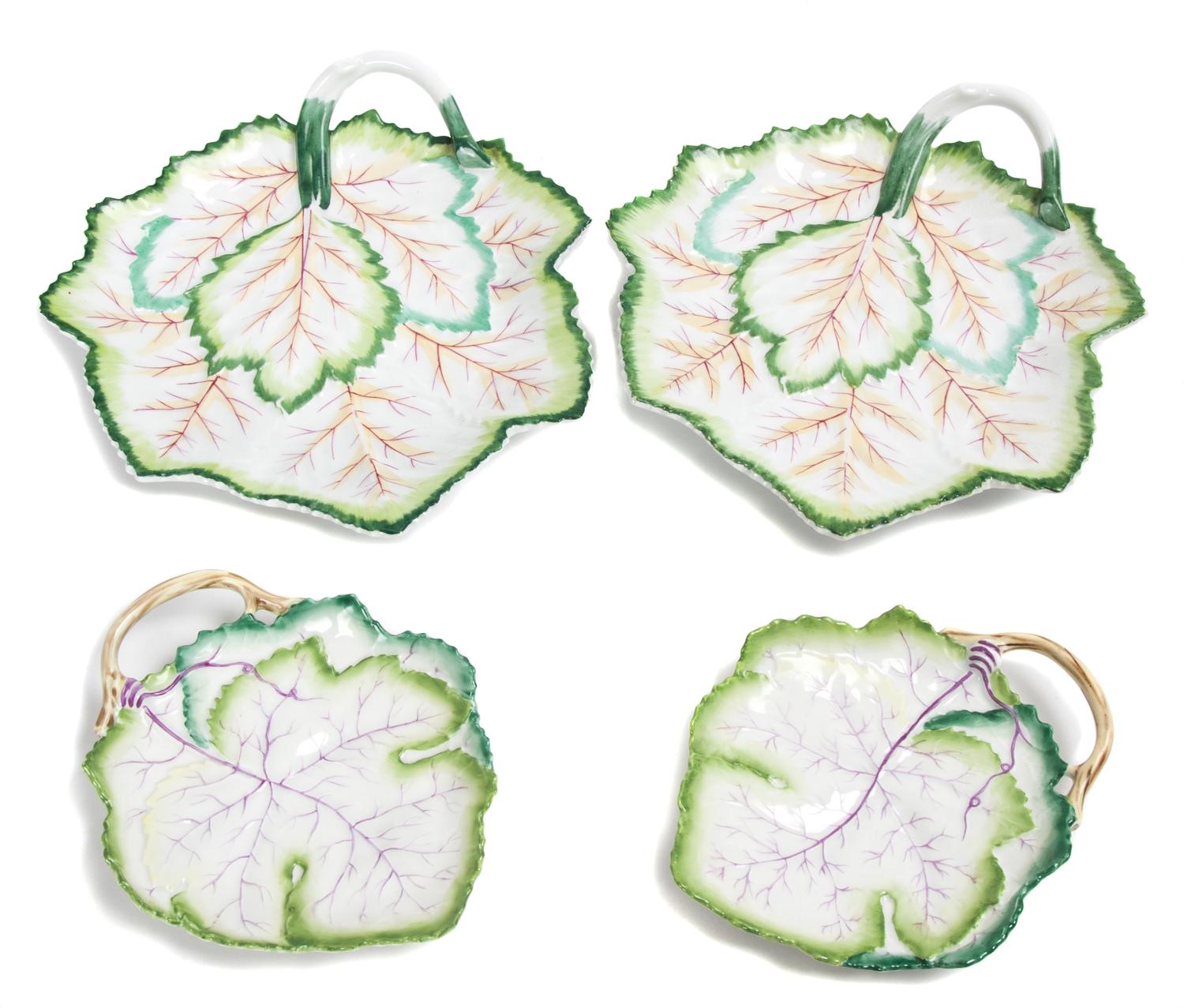 A Group of Four English Porcelain Leaf Form Plates Width of largest 9 inches.