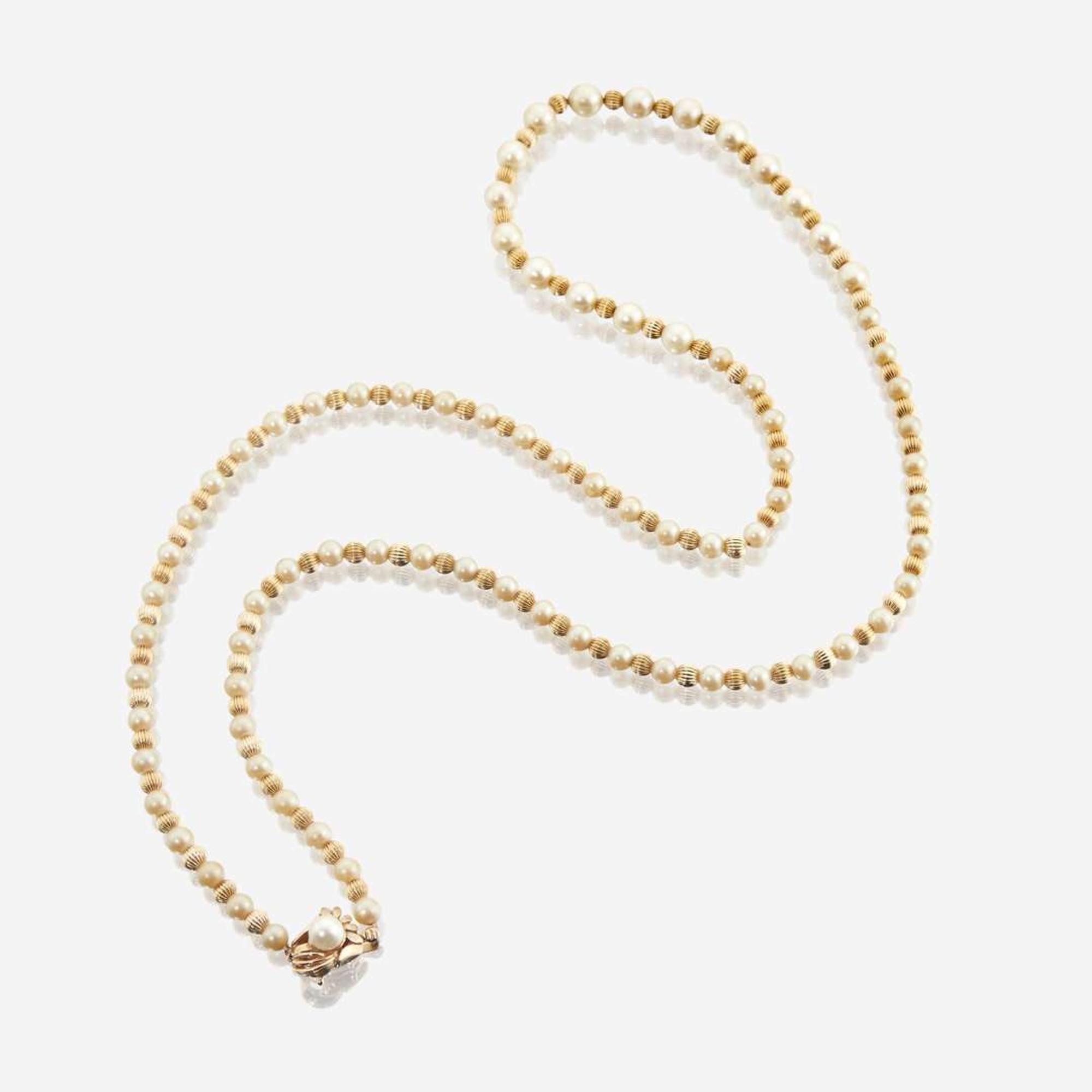 A collection of two cultured pearl necklaces and one bracelet