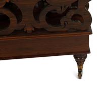 A Late Regency Carved Mahogany Canterbury