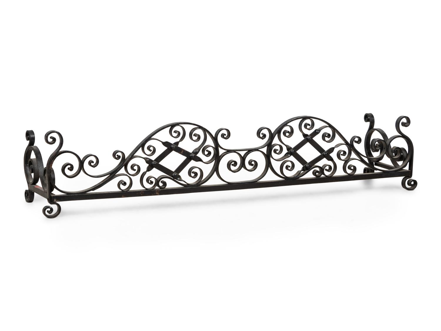 A Wrought Iron Fireplace Fender