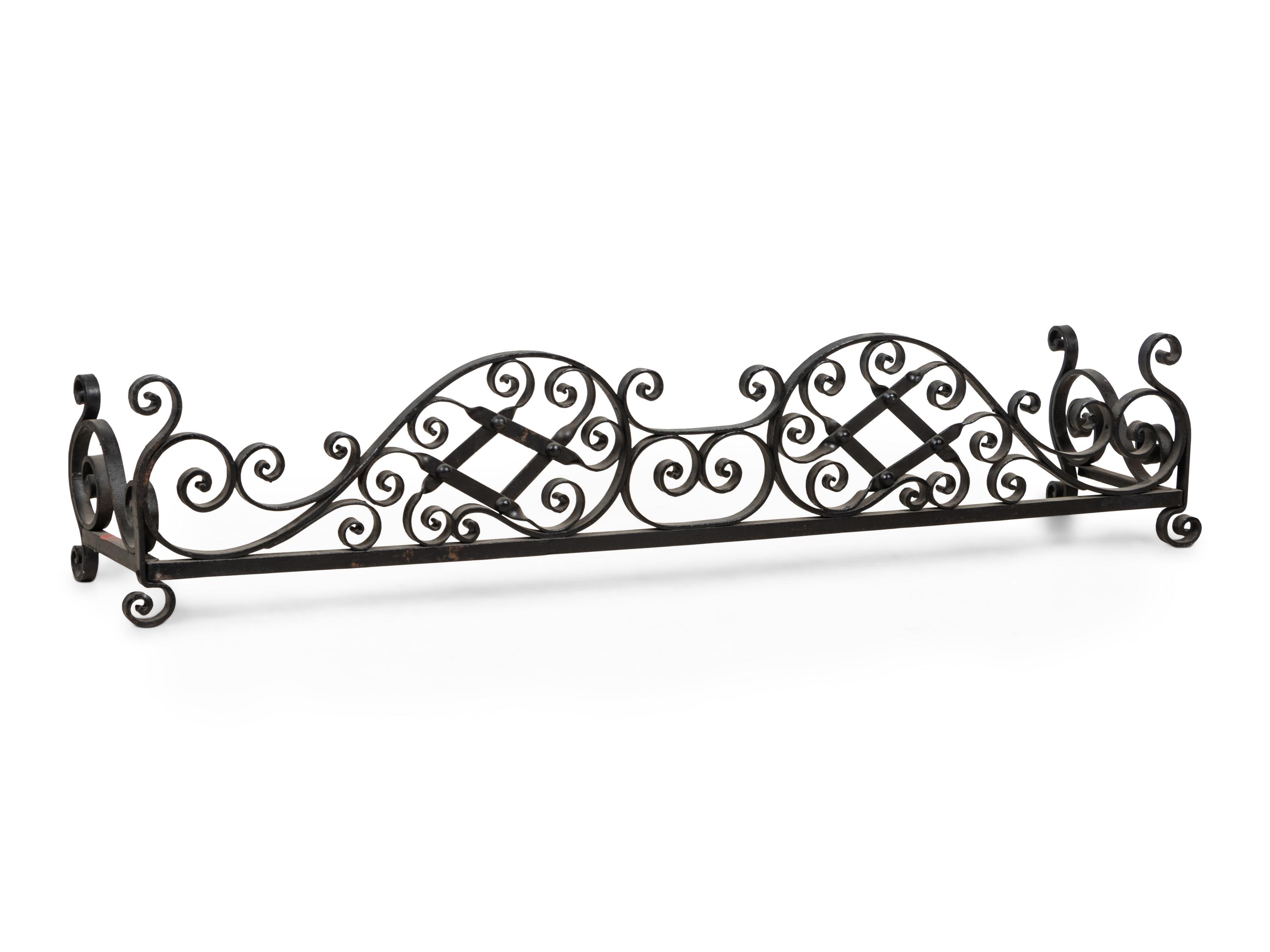 A Wrought Iron Fireplace Fender