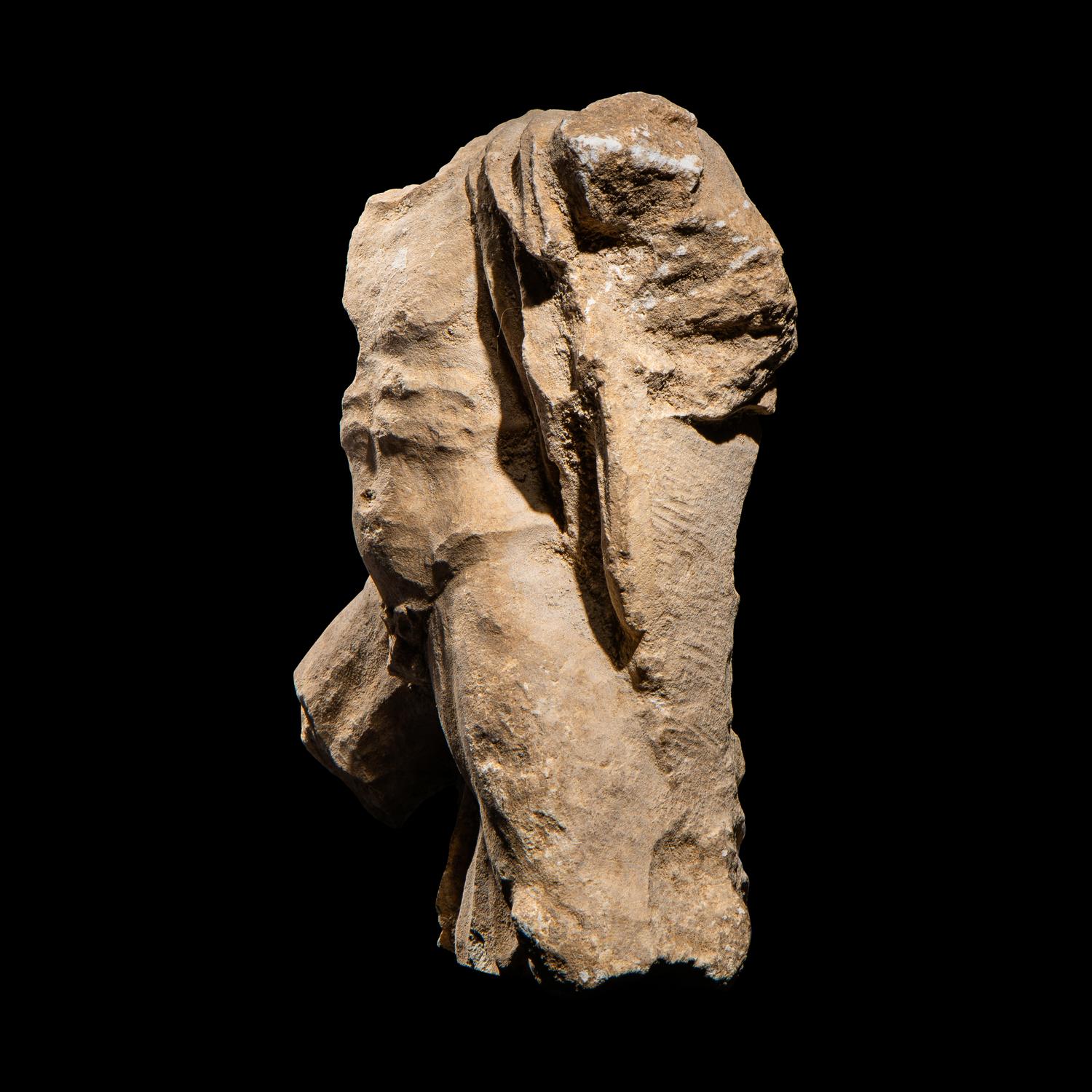 A Tarantine Limestone Sculpture of a Nude Hero