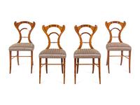 A Set of Four Biedermeier Inlaid Dining Chairs
