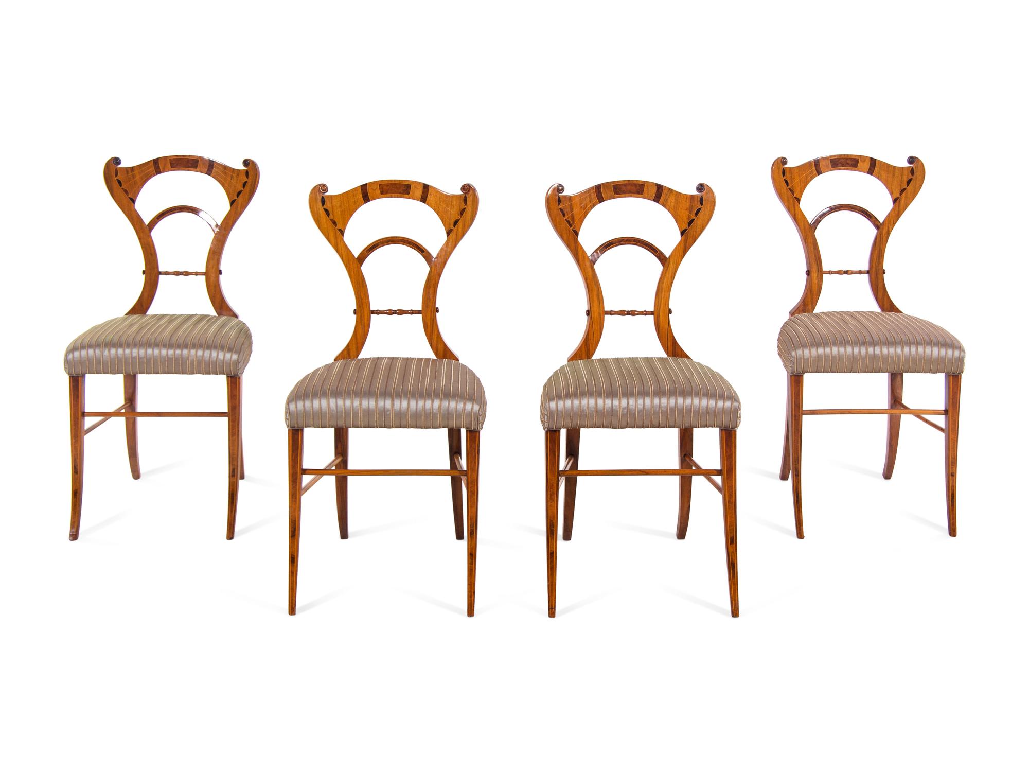 A Set of Four Biedermeier Inlaid Dining Chairs