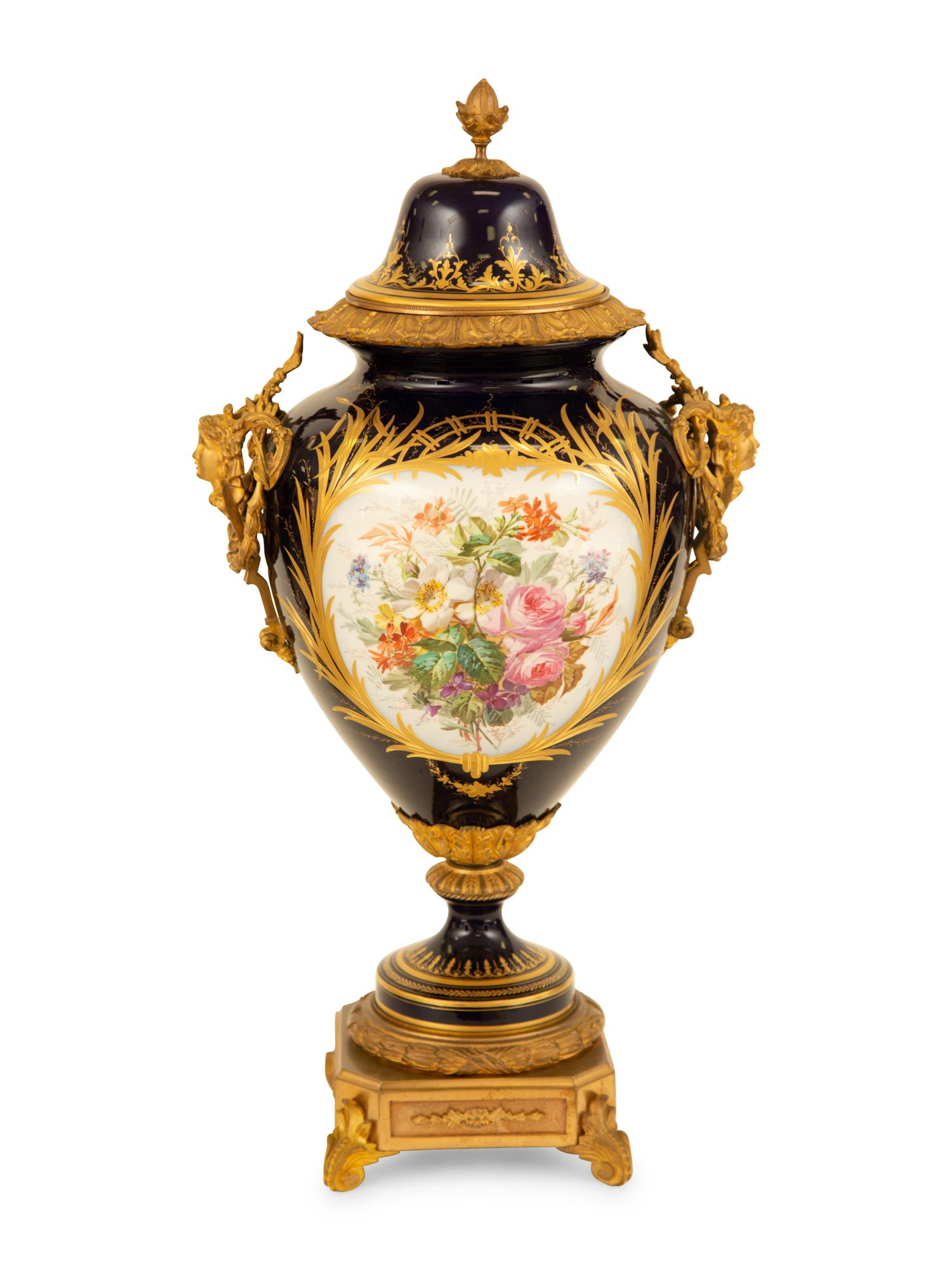 A Sèvres Style Gilt Metal Mounted Porcelain Urn and Cover