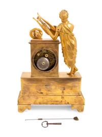 An Empire Gilt Bronze Figural Mantel Clock