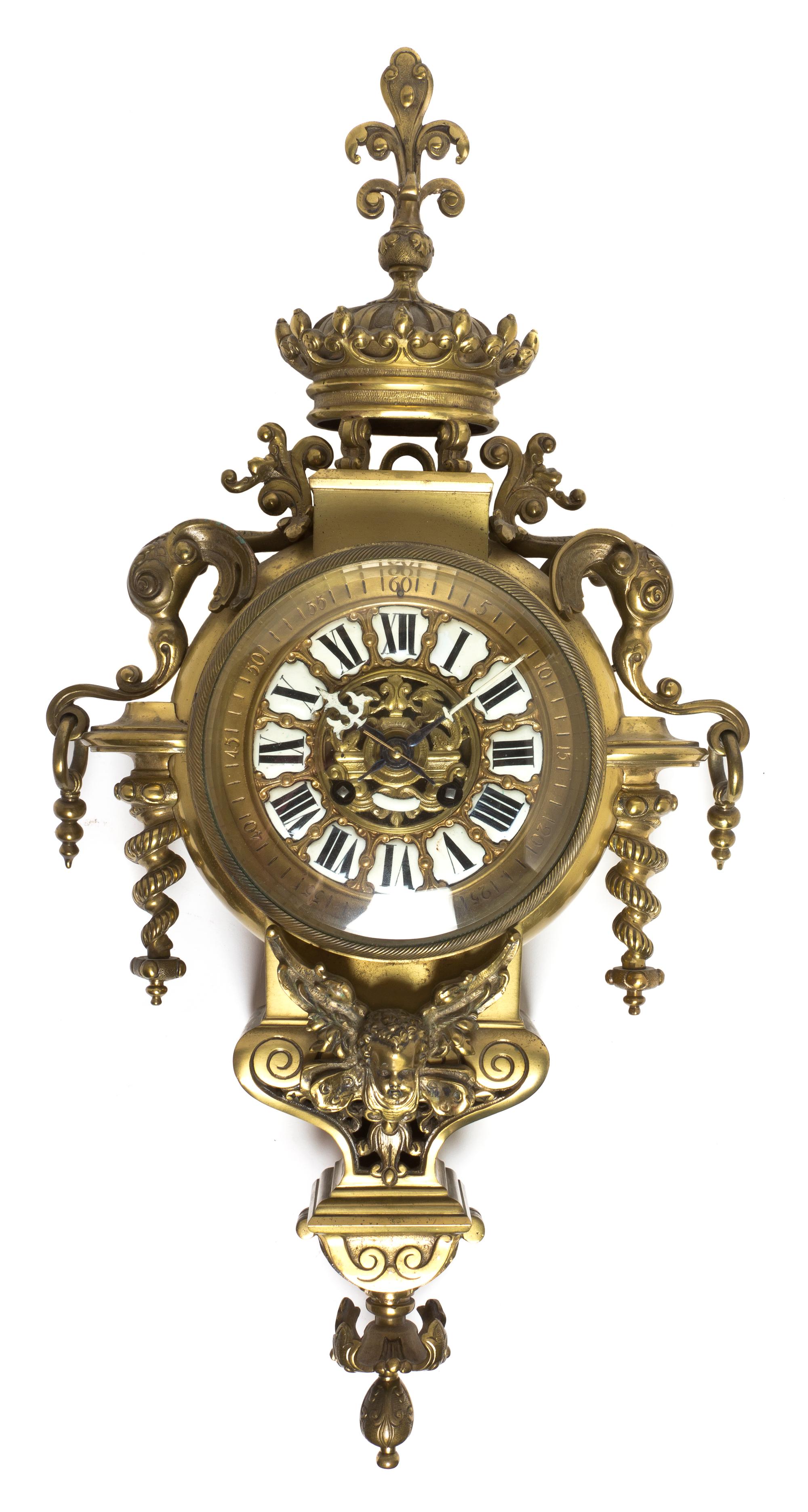 A Neoclassical Brass Cartel Clock, Height 21 inches.