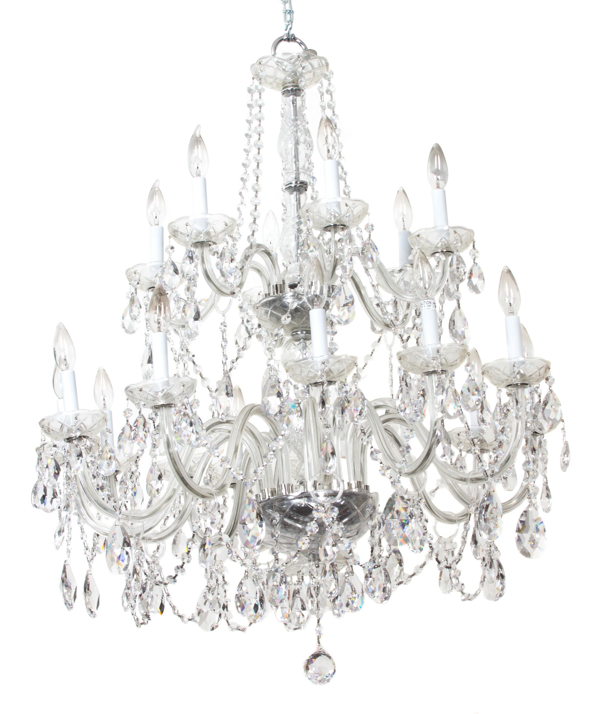 A Cut Glass Eighteen Light Chandelier Height 41 x diameter 32 inches. — 20TH CENTURY