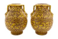 A Pair of Glazed Terracotta Urns, Height 16 1/2 inches.