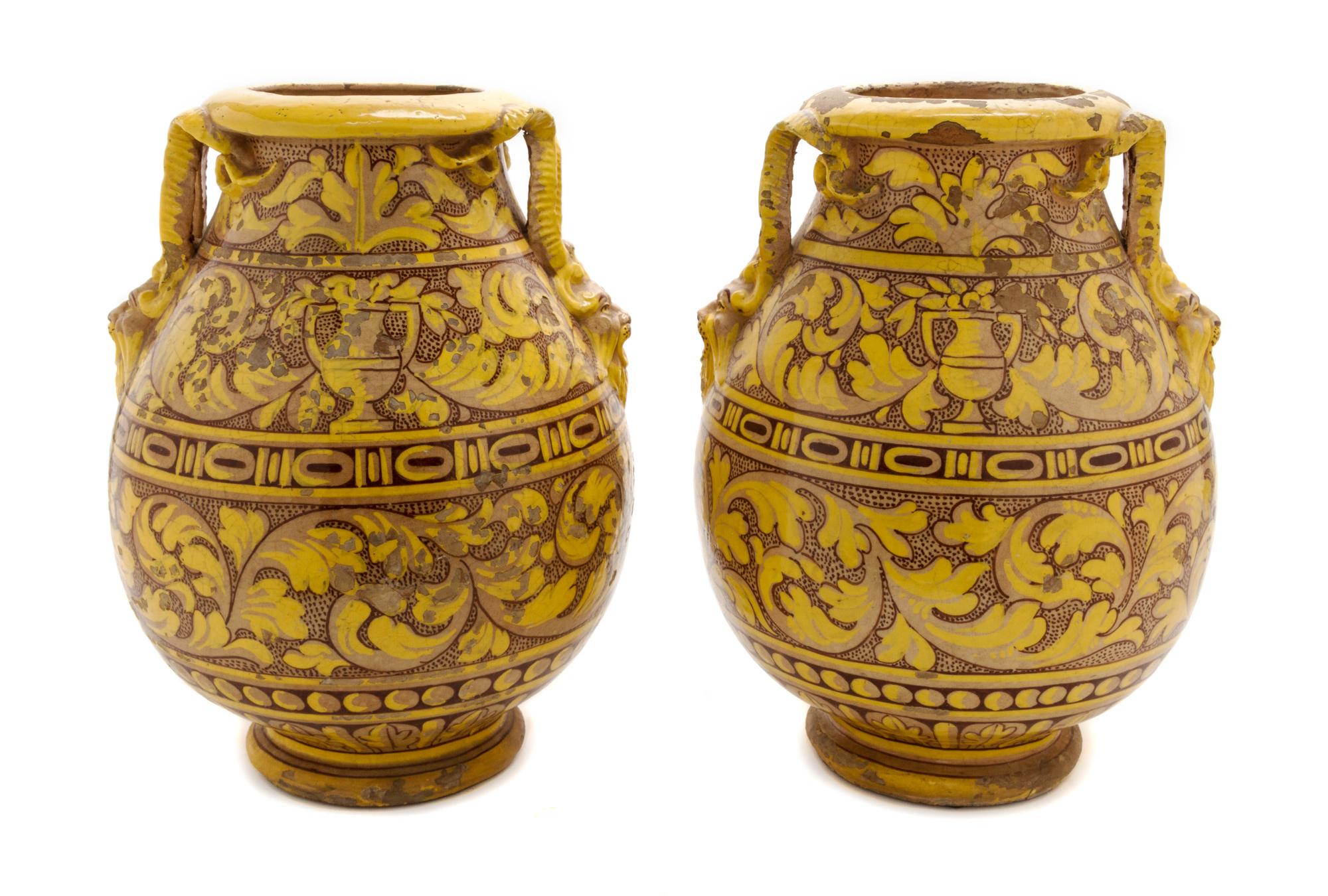 A Pair of Glazed Terracotta Urns, Height 16 1/2 inches.